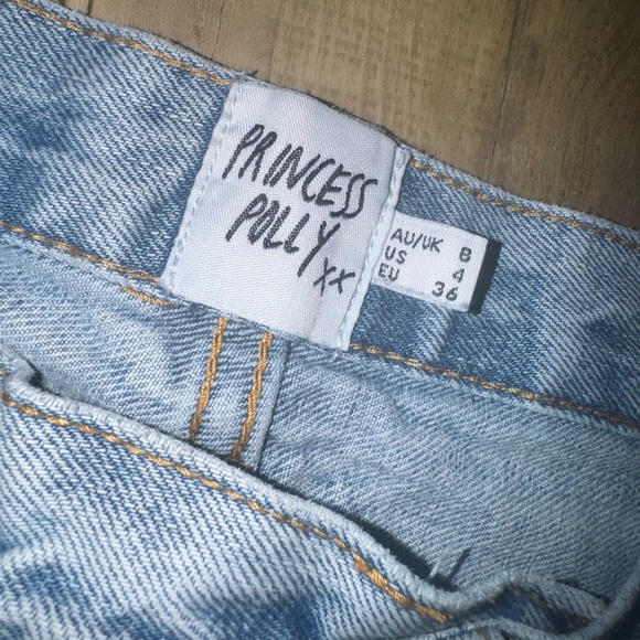 Princess Polly HOLLY Highrise ASYMMETRIC RIPPED LEG JEANS LIGHT WASH DENIM - Picture 3 of 10